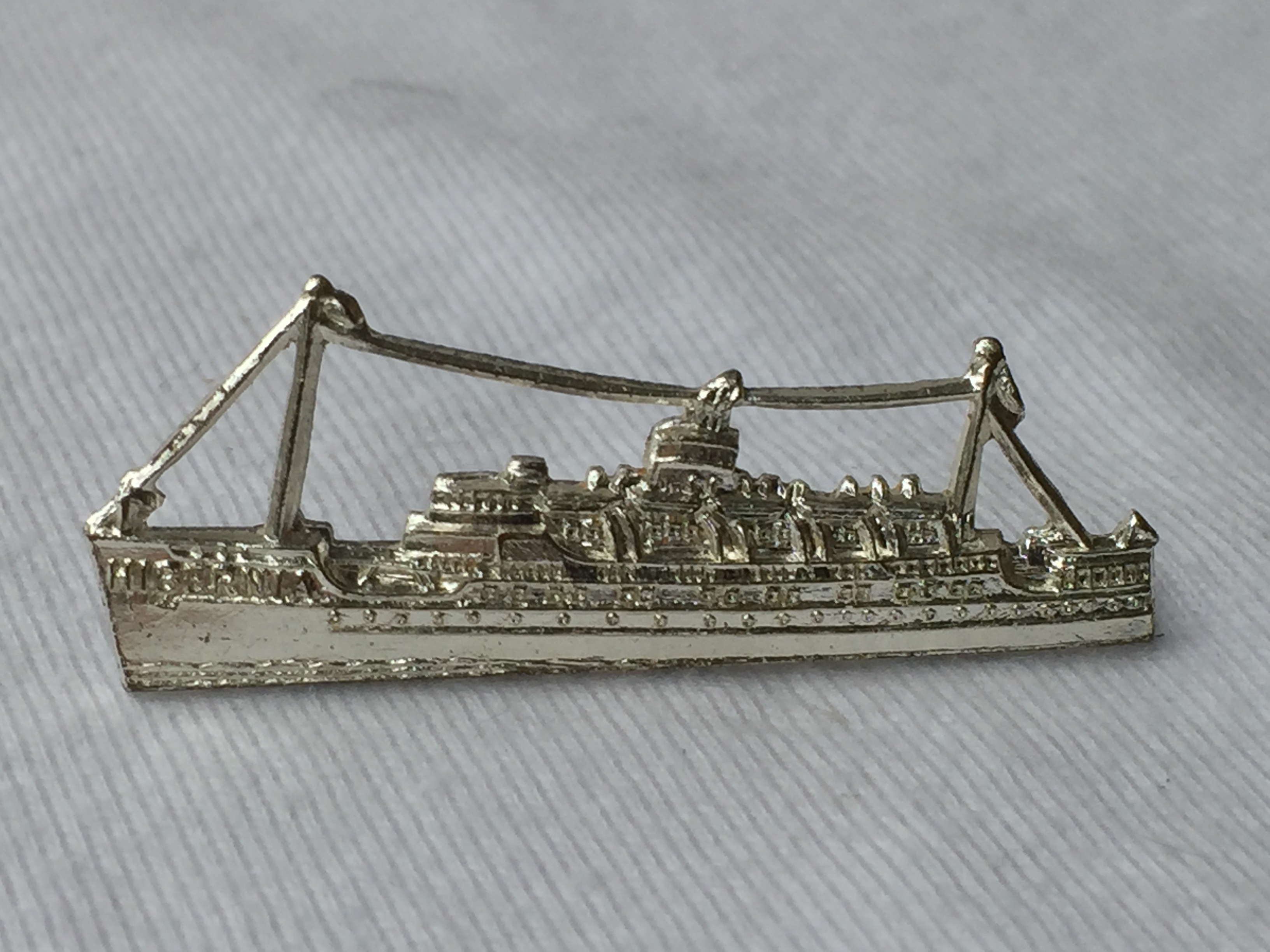 SHIP SHAPE LAPEL PIN OF THE SEA CROSSING VESSEL THE MV HIBERNIA